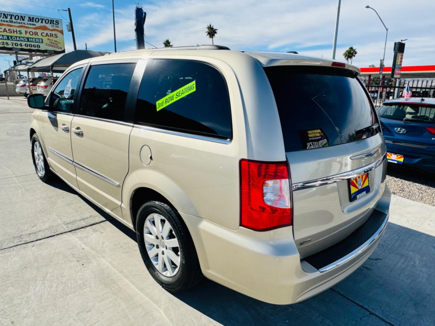 2015 gold Chrysler Town & Country (2C4RC1BG8FR) , located at 2190 Hwy 95, Bullhead City, AZ, 86442, (928) 704-0060, 0.000000, 0.000000 - 2015 Chrysler town and country . Loaded . Seats7 . Bluetooth , backup camera . Free warranty , we finance . drop down tv with dvd player. headphone sets. Michelin tires. v6 automatic . Top of the line van. Fully loaded. - Photo#5